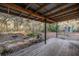 Wooden deck overlooking a wooded backyard at 11317 Salina St, Brooksville, FL 34614