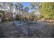 Enclosed garden area with raised beds and plants at 11317 Salina St, Brooksville, FL 34614