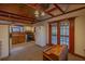 Bright kitchen with wood cabinets and French doors leading outdoors at 11317 Salina St, Brooksville, FL 34614