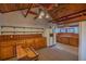 Updated kitchen with wood cabinets and ample counter space at 11317 Salina St, Brooksville, FL 34614