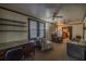 Spacious living room with vintage furniture and ceiling fan at 11317 Salina St, Brooksville, FL 34614
