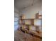 Functional pantry with built-in wooden shelving at 11317 Salina St, Brooksville, FL 34614