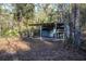 Rustic workshop with covered work area at 11317 Salina St, Brooksville, FL 34614