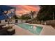 Stunning pool at sunset in a private backyard at 1212 59Th S St, Gulfport, FL 33707