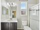 Clean bathroom with vanity, toilet, and shower at 10710 Southern Forest Dr, Riverview, FL 33578