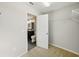 Spacious bedroom with walk-in closet and neutral tones at 10710 Southern Forest Dr, Riverview, FL 33578