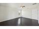 Bright bedroom with hardwood floors and window view at 10710 Southern Forest Dr, Riverview, FL 33578