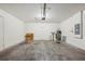 Unfinished garage with ample space for storage at 10710 Southern Forest Dr, Riverview, FL 33578