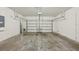 Clean and spacious garage with overhead storage at 10710 Southern Forest Dr, Riverview, FL 33578