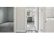 Laundry room with washer, dryer, and access to bathroom at 10710 Southern Forest Dr, Riverview, FL 33578