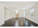 Large living room, hardwood floors, and an open concept floor plan at 10710 Southern Forest Dr, Riverview, FL 33578