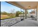 Spacious screened patio overlooking a large backyard at 10710 Southern Forest Dr, Riverview, FL 33578