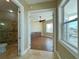 Hallway with access to bedroom and bathroom at 13737 Victor Ave, Hudson, FL 34667