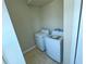 Bright laundry room with washer and dryer included at 13737 Victor Ave, Hudson, FL 34667