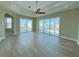 Bright living room with water views and sliding glass doors at 13737 Victor Ave, Hudson, FL 34667