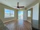 Bright living room with hardwood floors and water views at 13737 Victor Ave, Hudson, FL 34667