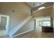 Elegant staircase leading to an open living area at 13737 Victor Ave, Hudson, FL 34667