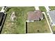 House with fenced backyard and adjacent empty lot at 4154 Duluth Ter, North Port, FL 34286