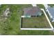 House with fenced backyard and adjacent empty lot at 4154 Duluth Ter, North Port, FL 34286