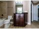 Bathroom features granite countertop and dark wood vanity at 4154 Duluth Ter, North Port, FL 34286