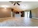 Modern kitchen with dark wood cabinets, stainless steel appliances, and an island at 4154 Duluth Ter, North Port, FL 34286