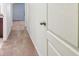 Bright hallway with carpeted floors leading to other rooms at 13752 Reindeer Cir, Hudson, FL 34669