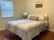 Comfortable bedroom with hardwood floors and neutral decor at 4701 22Nd N Ave, St Petersburg, FL 33713