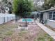 Large backyard with a pool and fire pit at 7848 Teal Dr, New Port Richey, FL 34653