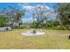 Firepit and seating area in backyard at 4760 84Th N Ter, Pinellas Park, FL 33781