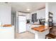 Modern kitchen with white cabinets, butcher block counter at 4760 84Th N Ter, Pinellas Park, FL 33781