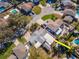 Aerial view of single-Gathering home with pool and large backyard, located in a residential neighborhood at 8280 140Th St, Seminole, FL 33776