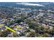 Aerial view of a single Gathering home with a pool, located in a quiet neighborhood at 8280 140Th St, Seminole, FL 33776