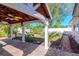 Backyard with covered patio, fire pit and shed at 8280 140Th St, Seminole, FL 33776