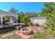 Backyard with firepit, pergola, and storage shed at 8280 140Th St, Seminole, FL 33776