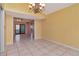 Bright dining area with tile floors and a chandelier, open to the Gathering room at 8280 140Th St, Seminole, FL 33776