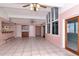 Gathering room with tile floors, high ceilings, and access to a sunroom at 8280 140Th St, Seminole, FL 33776