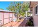 Side yard with brick path and storage shed at 8280 140Th St, Seminole, FL 33776