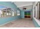 Bright sunroom with tile floors and ceiling fan at 8280 140Th St, Seminole, FL 33776
