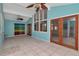 Sunroom with tile floors, wood doors and windows at 8280 140Th St, Seminole, FL 33776