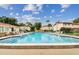 Inviting community swimming pool with lounge chairs at 1655 58Th S Ter # 3, St Petersburg, FL 33712