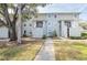 Two-story building with multiple units and a walkway at 7182 E Bank Dr # 7-103, Tampa, FL 33617