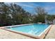 Inviting community pool with ample surrounding space at 7182 E Bank Dr # 7-103, Tampa, FL 33617