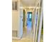 Hallway with multiple doors at 7644 Arlight Dr, New Port Richey, FL 34655