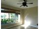 Dining area with natural light from large windows at 24289 Toth Ln, Punta Gorda, FL 33955