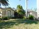 Beautiful single-story home featuring mature landscaping and a neutral color palette at 24289 Toth Ln, Punta Gorda, FL 33955