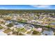 Bird's-eye view of a waterfront home and neighborhood at 1965 Neptune Dr, Englewood, FL 34223