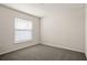 Bright bedroom with a large window and neutral carpeting at 2614 58Th E Cir, Palmetto, FL 34221
