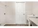 Functional laundry room with a utility sink and a white door at 2614 58Th E Cir, Palmetto, FL 34221