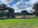 Community playground with swings and play structures at 6704 N 13Th St, Tampa, FL 33604