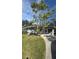 Single-story home with carport and mature landscaping at 3967 Arkansas Ne Ave, St Petersburg, FL 33703